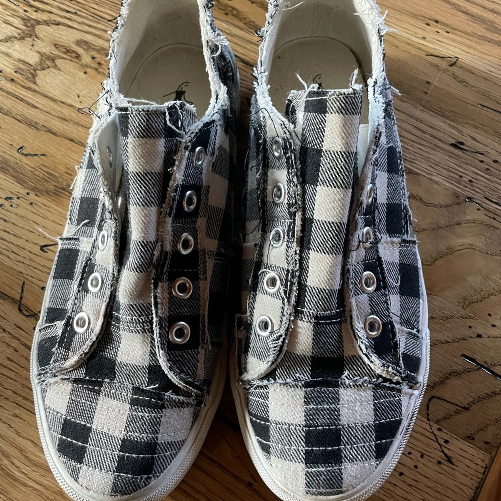Corey’s size 8 cute canvas shoes.